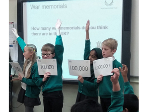 Year 4 pupils from Summerbank Primary School considering the number of war memorials in the UK © Martin Phillips, 2019