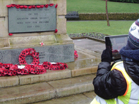 Year 5 pupils from Moorhouse Primary School photographing Milnrow war memorial, Rochdale during condition survey © War Memorials Trust, 2019